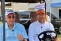 Personal de la organización de Santo Domingo 2026 en un vehículo dentro de las instalaciones de la Villa.