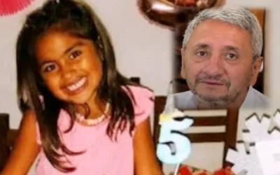 Imagen de archivo de Roque Lucero junto a una niña.
