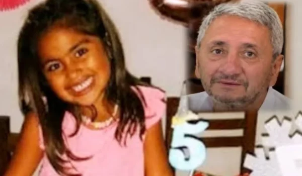 Imagen de archivo de Roque Lucero junto a una niña.