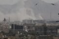 Humo sobre una zona urbana durante los ataques del conflicto entre Estados Unidos, Israel e Irán.