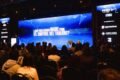 Público en una charla de FARO 2026, frente a un escenario con la identidad del encuentro.